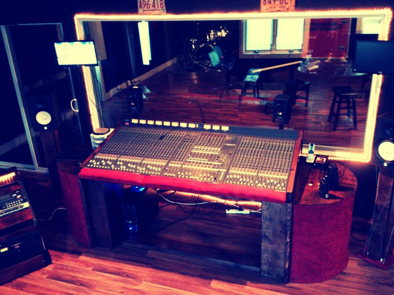Analog mixing console in a professional recording studio control room