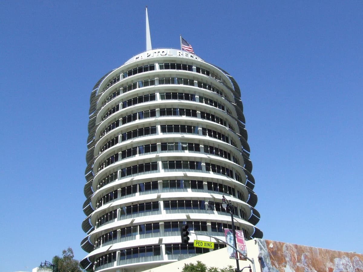 The cylindrical Capitol Records Building in Los Angeles under a clear blue sky