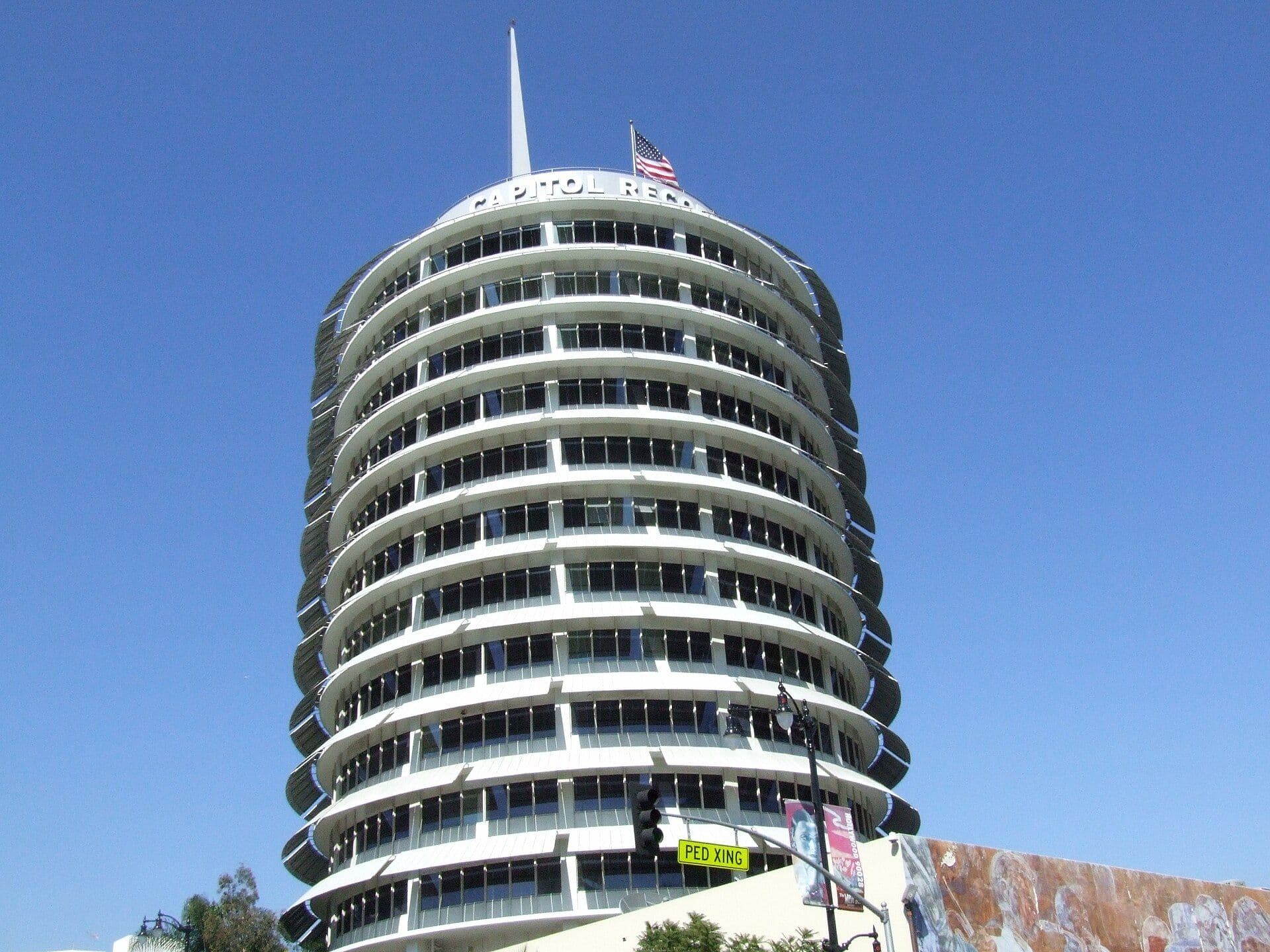 The cylindrical Capitol Records Building in Los Angeles under a clear blue sky