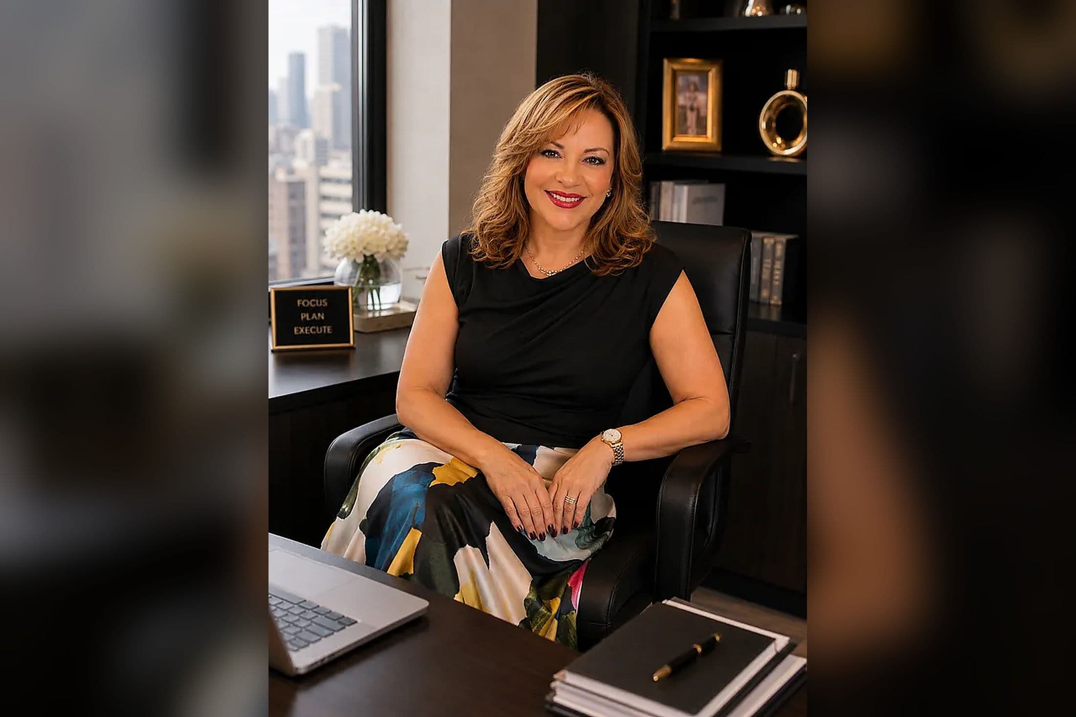 Samah Langner Moustafa, Group Chief Financial Officer of Go Behavioral and founder of Revnexa, seated at her desk