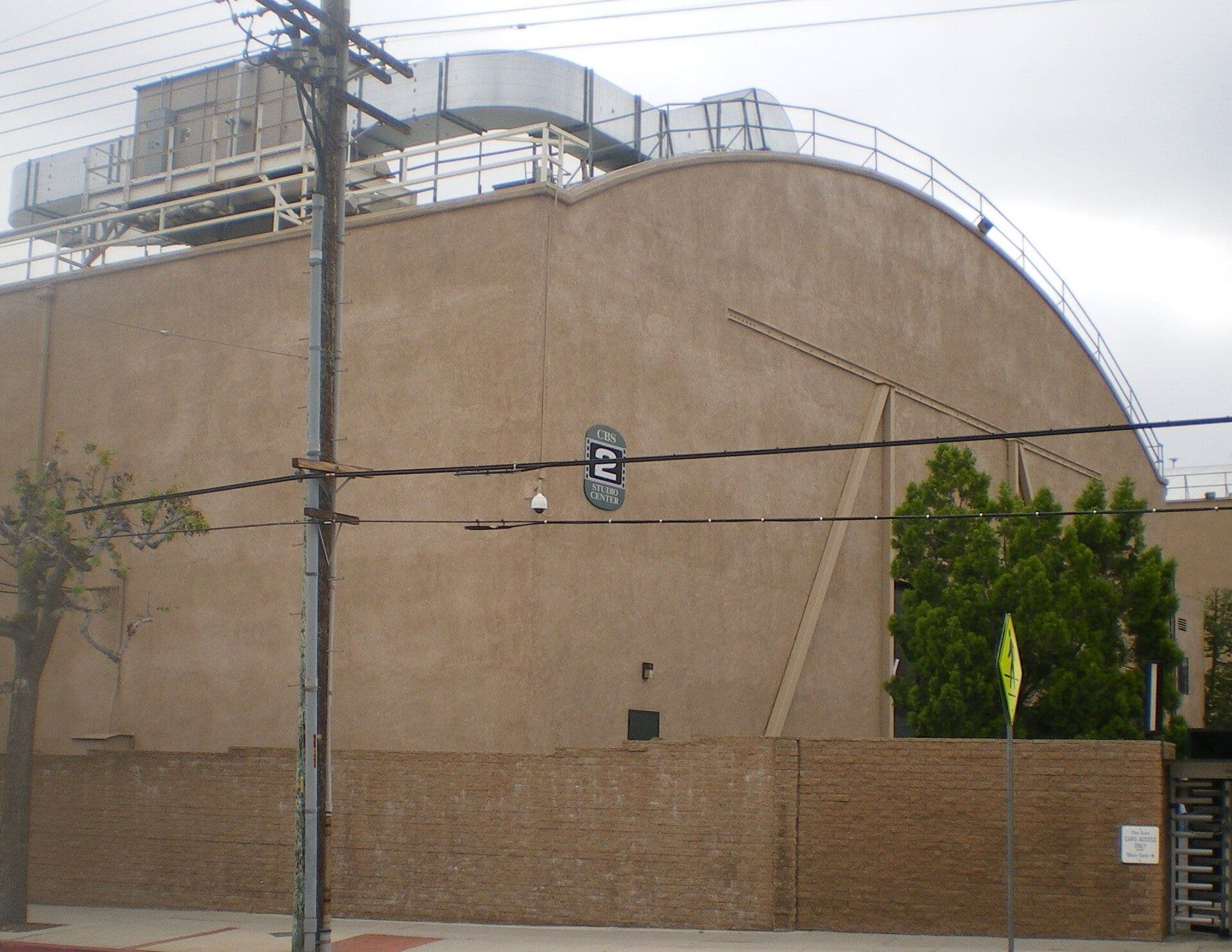 Soundstage 2 at Radford Studios with rounded brown facade and rooftop technical infrastructure
