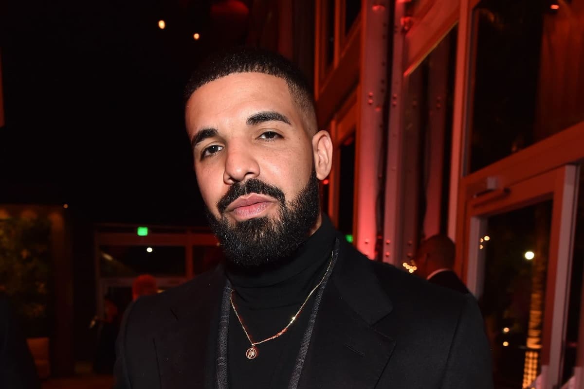 Drake, the Toronto rapper and singer, in a black coat and turtleneck at an evening event