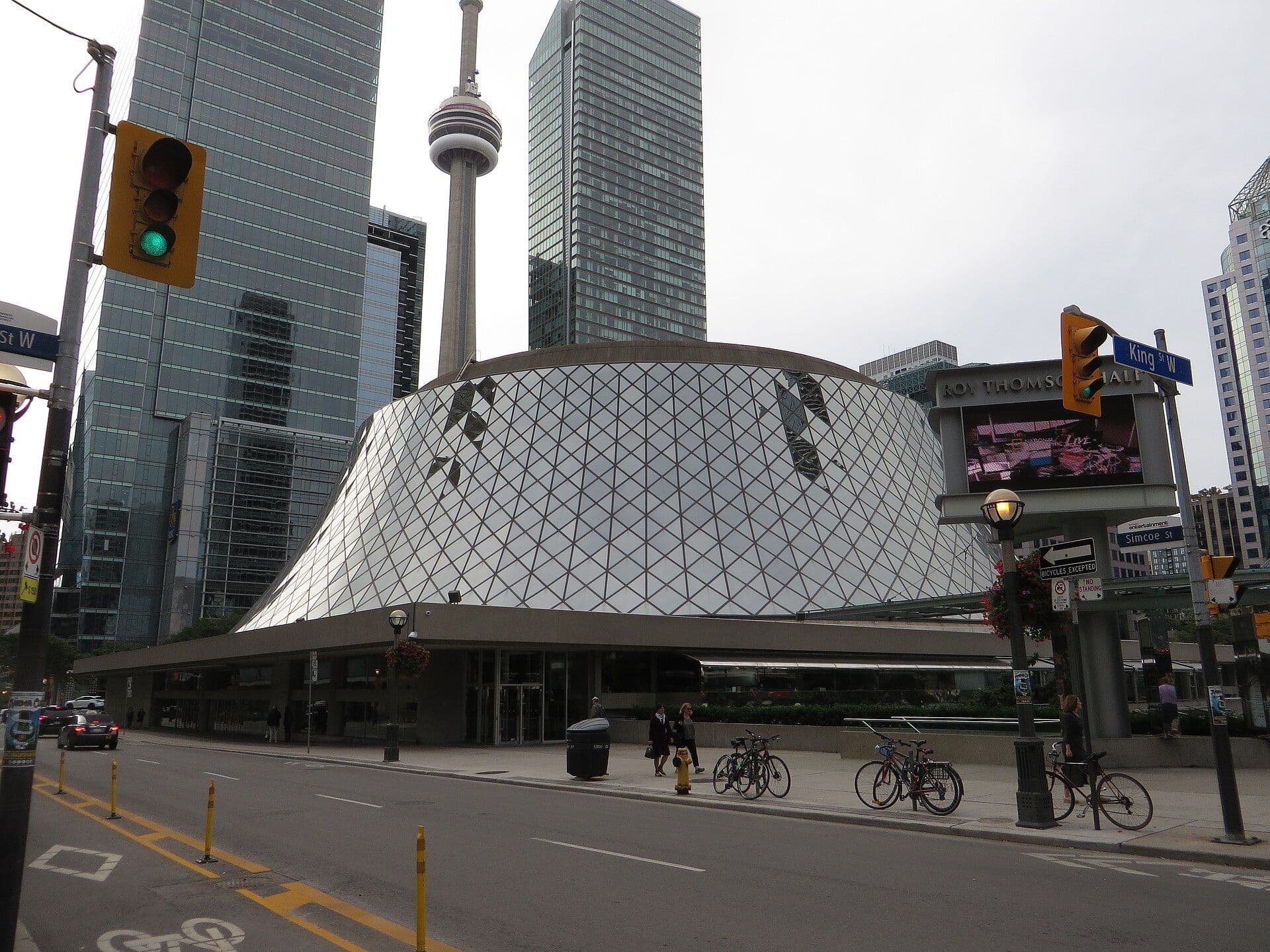 Royal Ontario Museum's white geometric dome with CN Tower in Toronto skyline