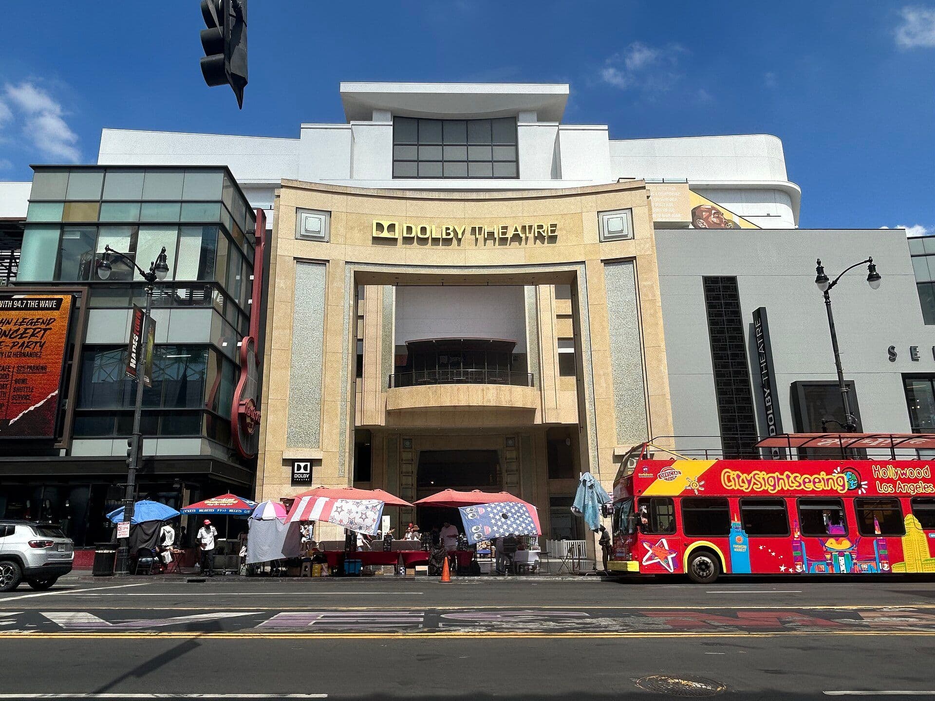 The Dolby Theatre entrance on Hollywood Boulevard under a clear blue sky